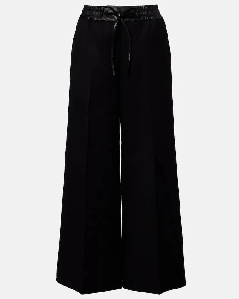 Alaïa AlaÃ¯a Pantaloni a gamba larga in lana vergine con finiture in pelle Nero