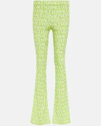 Versace Pantaloni flared in velluto con logo Verde