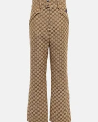 Gucci Pantaloni flared GG in canvas di cotone Marrone