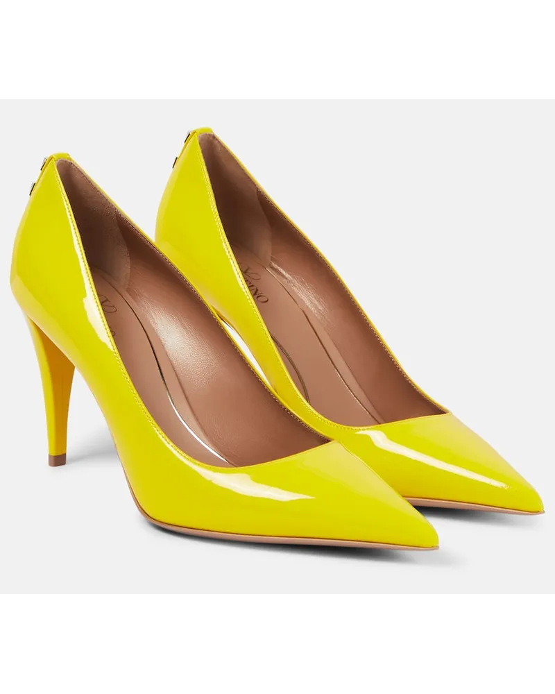 Valentino Garavani Pumps Rockstud in vernice Giallo