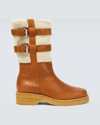 Christian Louboutin Stivali in pelle con shearling Marrone