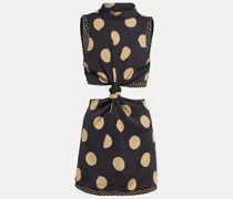 Top in raso a pois con cut-out
