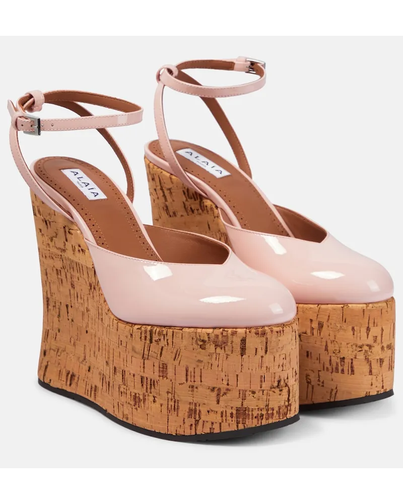 Alaïa AlaÃ¯a Pumps in vernice con zeppa Rosa