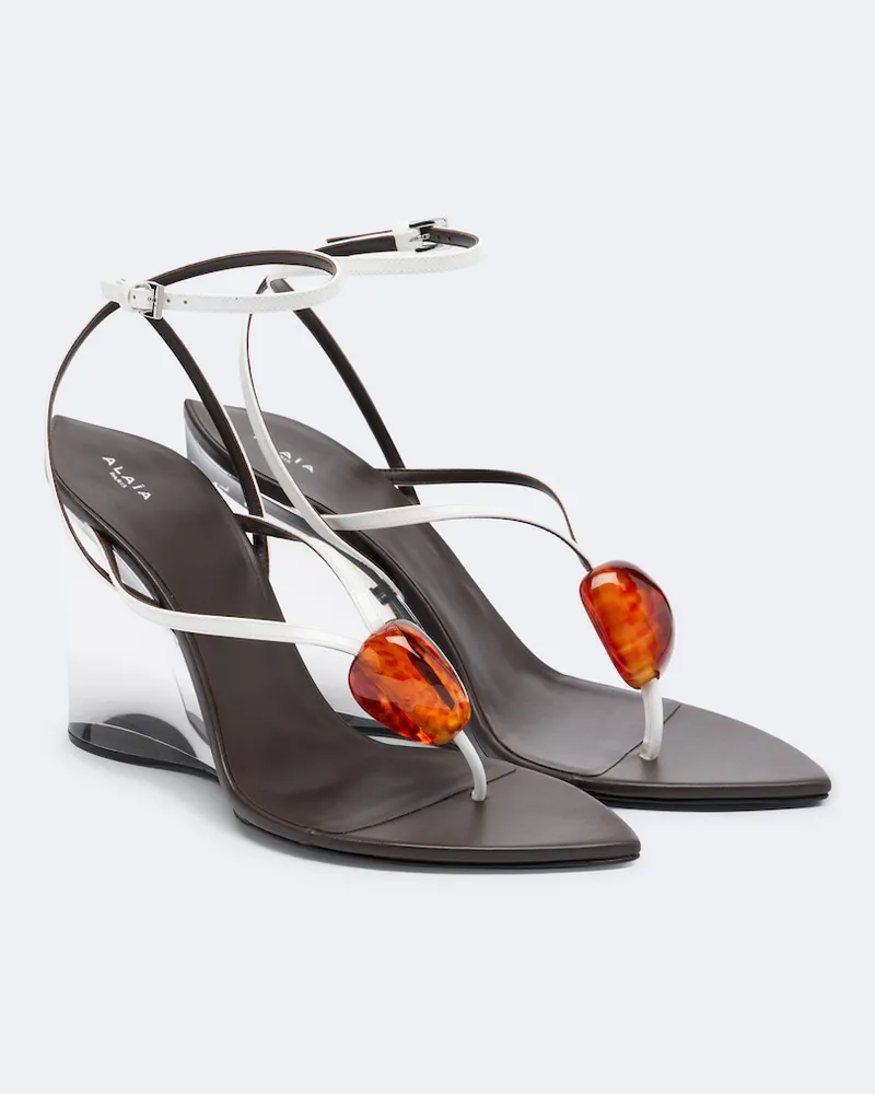 Alaïa Alaïa Sandali infradito Invisible in pelle con zeppa Bianco